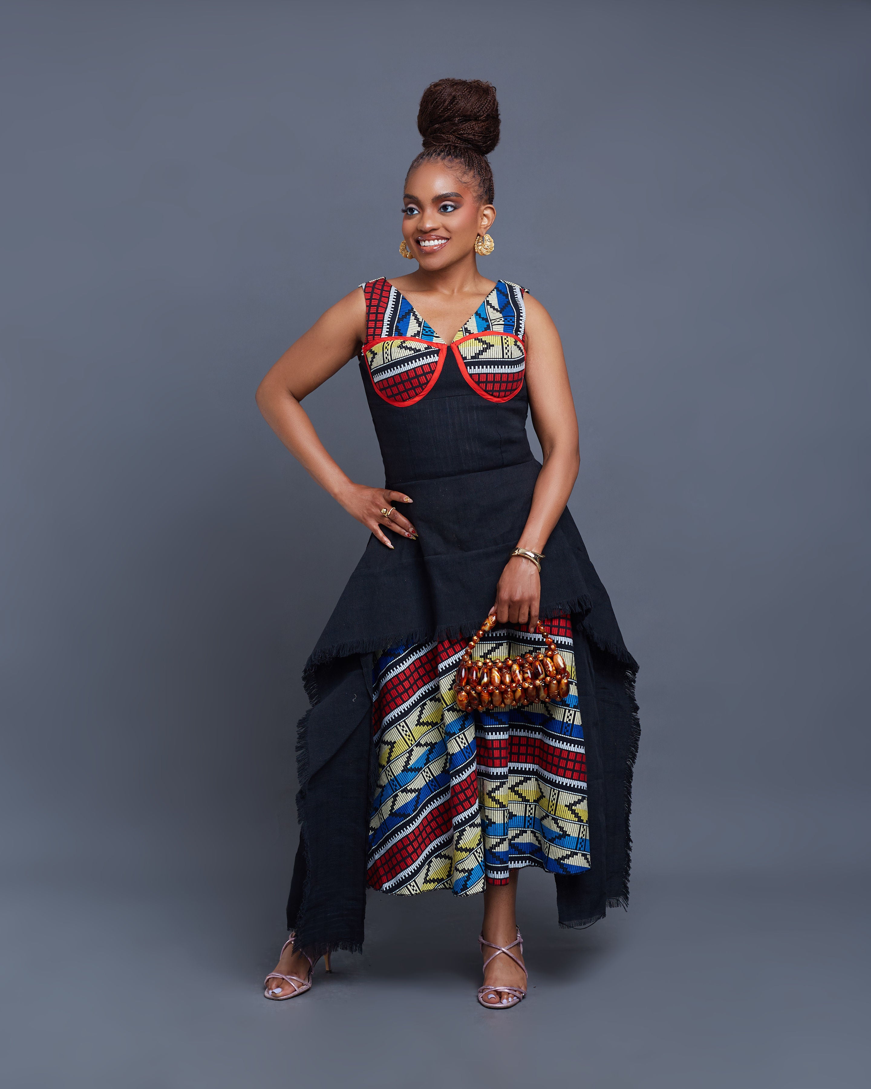Ifeyinwa dress in handwoven red Akwete and black Aso Oke — ÉLEVÉ Collection